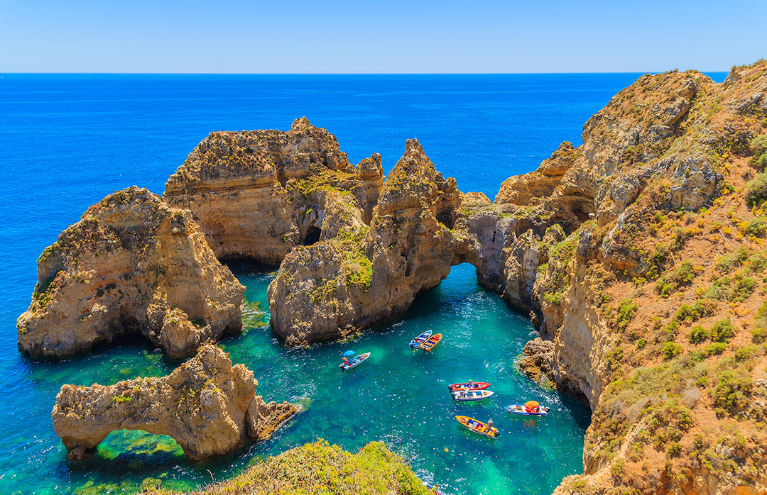 Cliffs and caves, Alvor, The Algarve | Simpson Travel